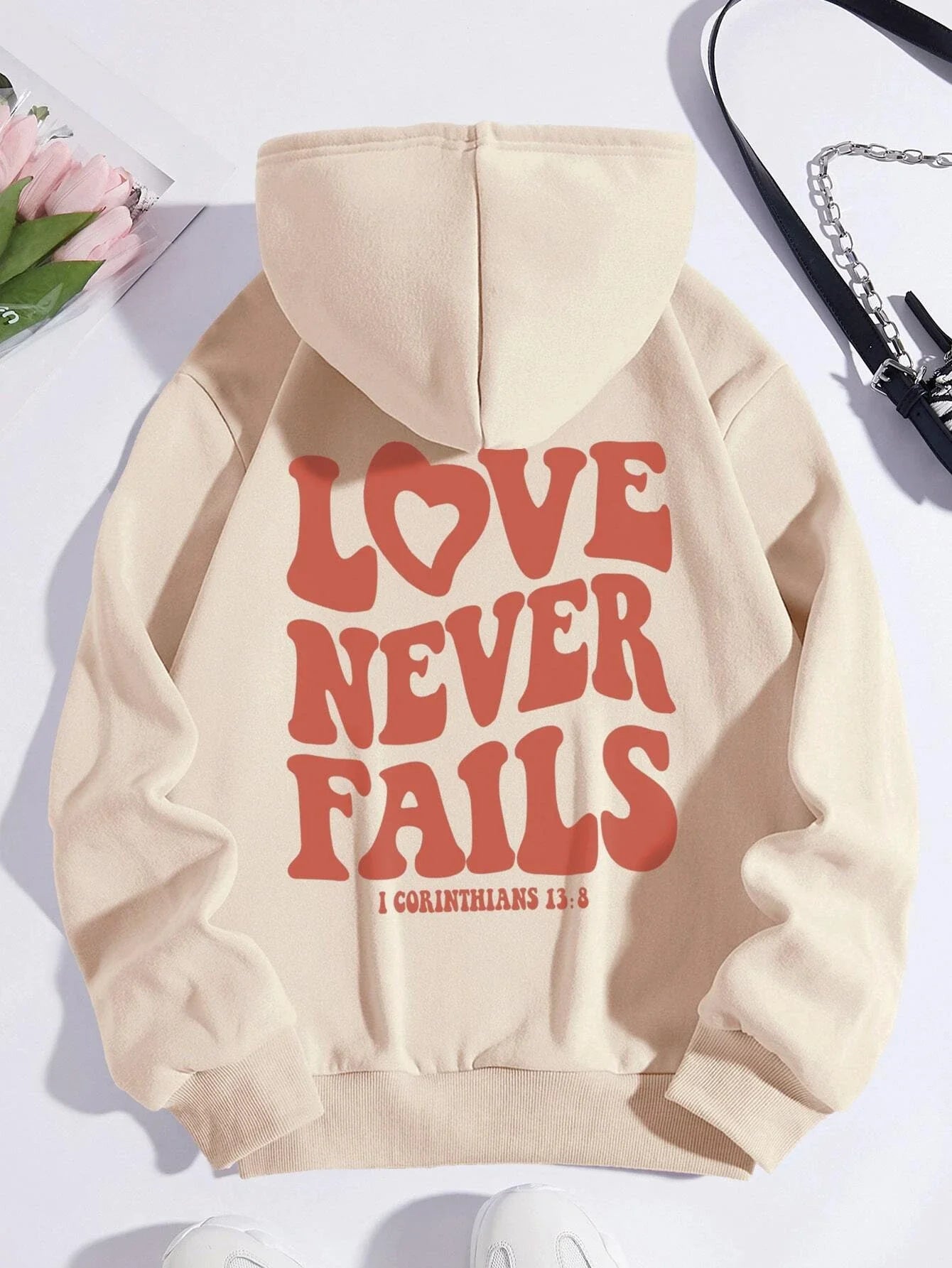 Women's fashionable, warm hooded Love Never Fails, hoodie