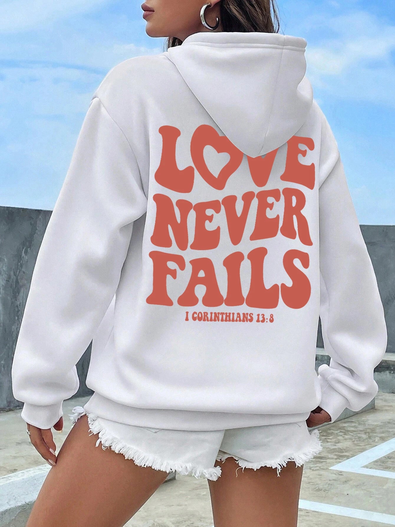 Women's fashionable, warm hooded Love Never Fails, hoodie