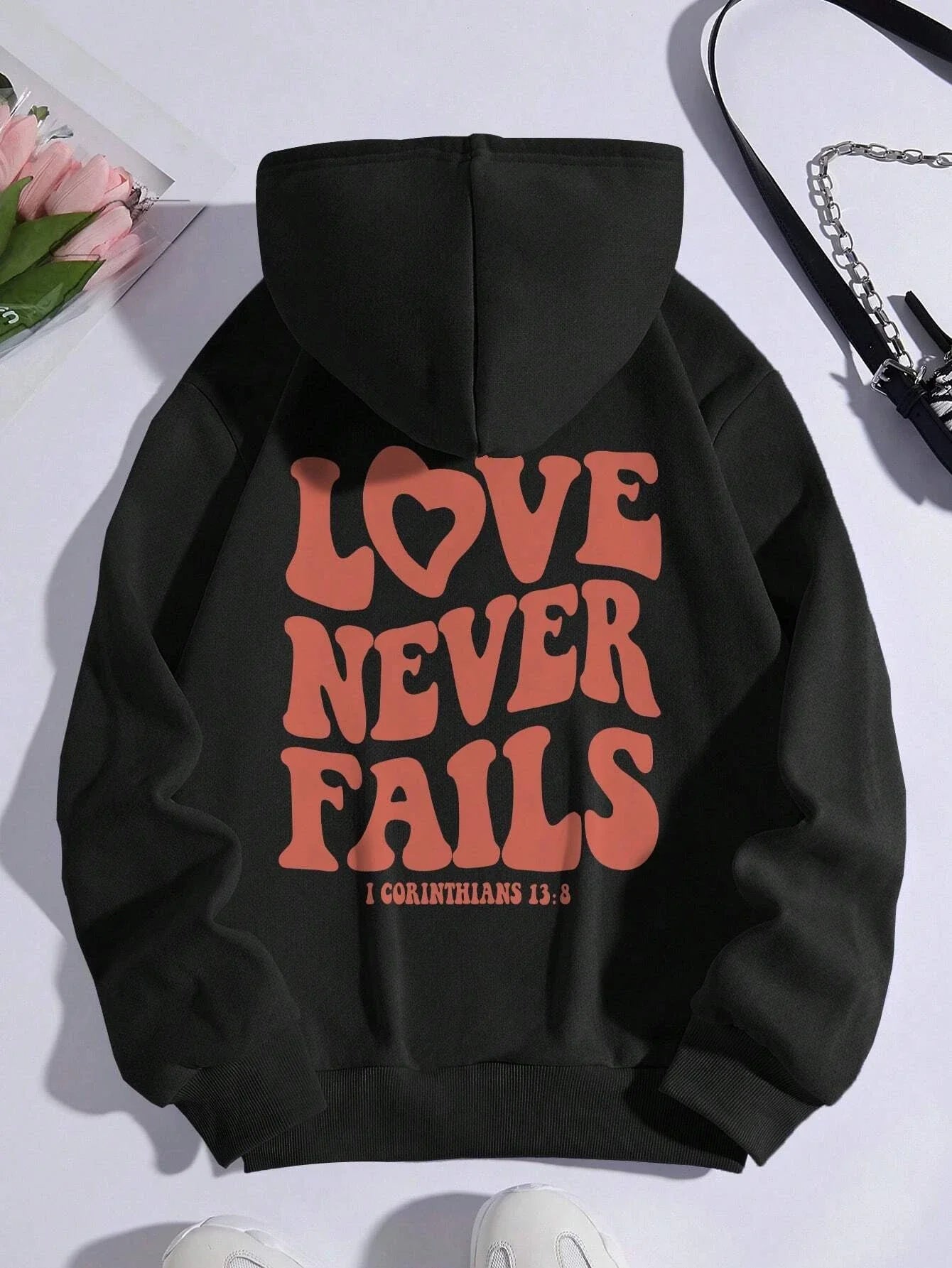 Women's fashionable, warm hooded Love Never Fails, hoodie